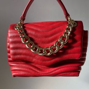 Vibrant cherry red genuine leather bag